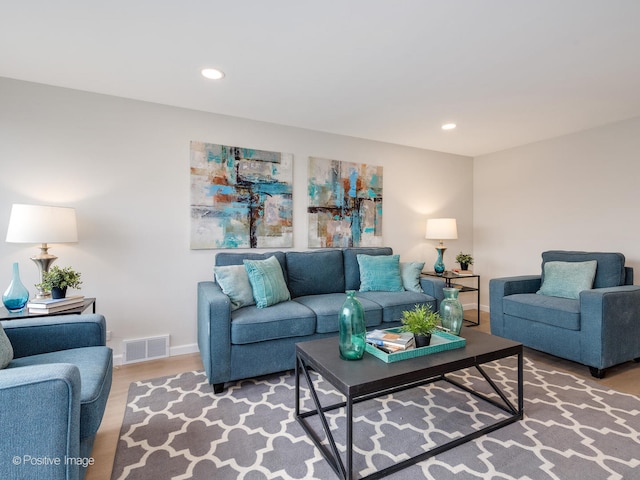 living room with hardwood / wood-style flooring