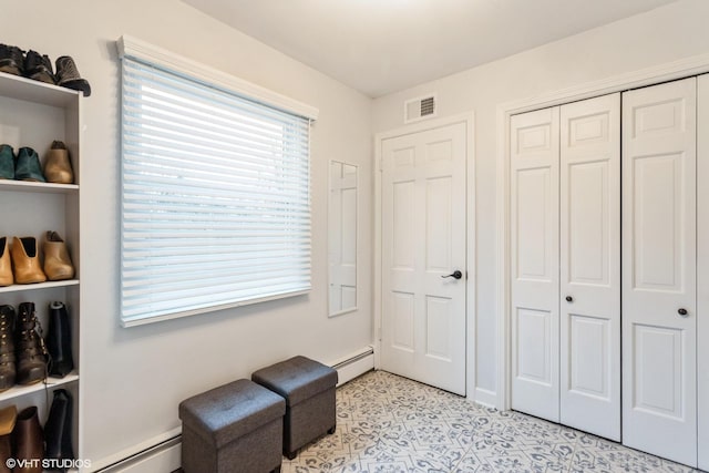 6430 Thurlow St, Willowbrook, IL 60527 - living area featuring baseboard heating