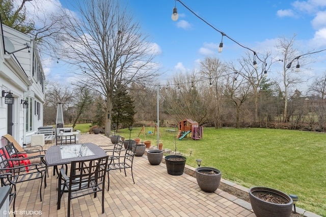 view of patio featuring a playground