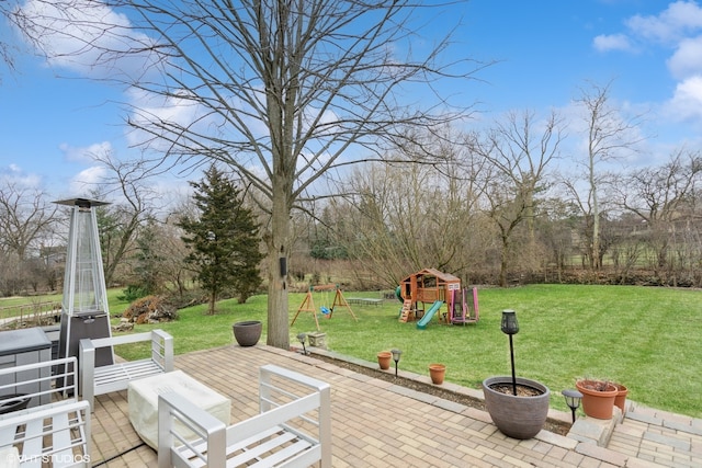 view of patio featuring a playground