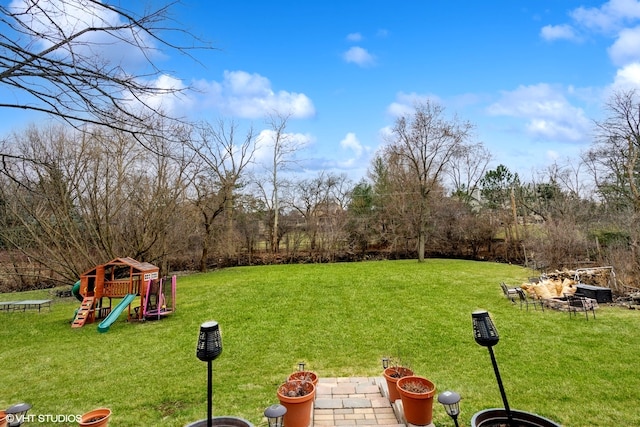 view of yard with a playground