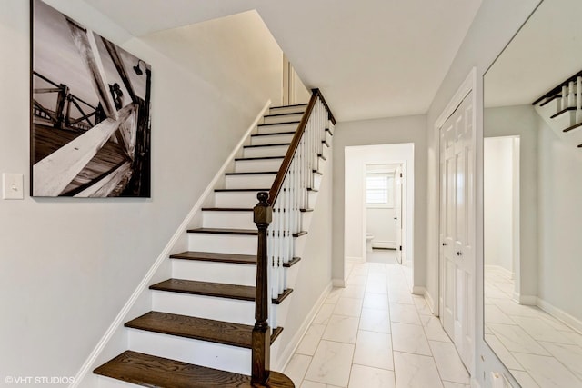 6430 Thurlow St, Willowbrook, IL 60527 - staircase with marble finish floors and baseboards