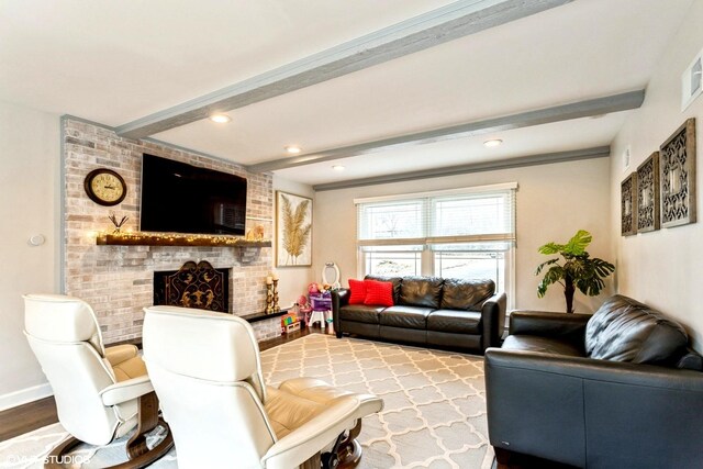 6430 Thurlow St, Willowbrook, IL 60527 - living area with beamed ceiling, a brick fireplace, baseboards, and recessed lighting