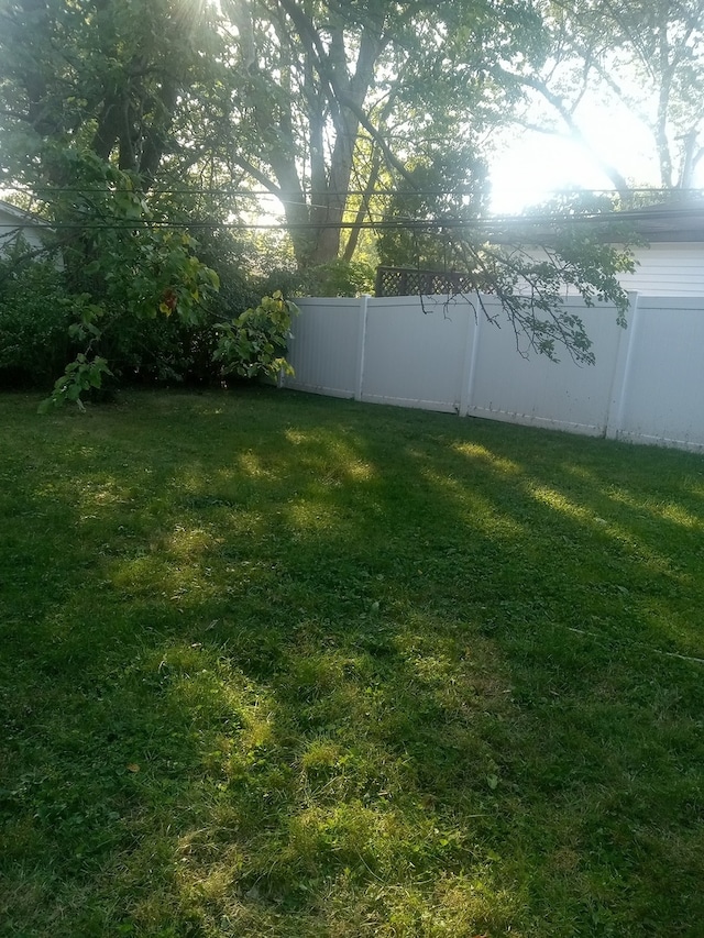 view of yard featuring fence