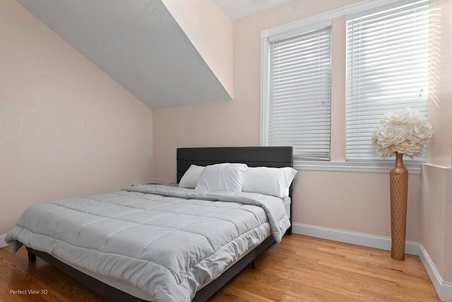 bedroom featuring light hardwood / wood-style floors