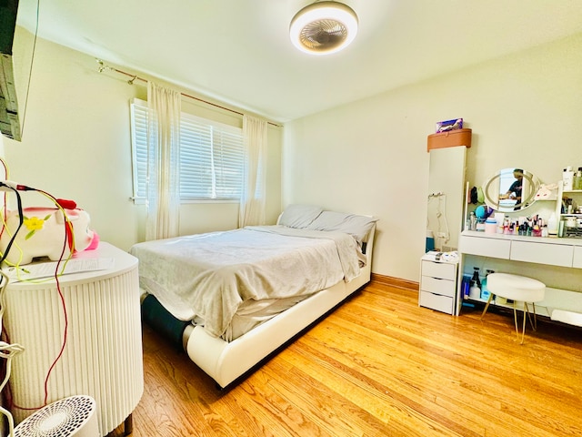 bedroom featuring hardwood / wood-style floors