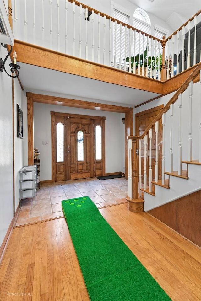 entryway with light hardwood / wood-style flooring