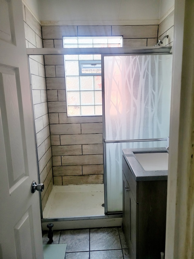 bathroom with vanity and walk in shower