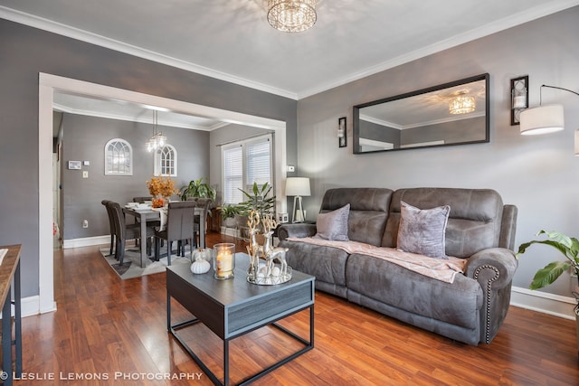 living room with crown molding and dark hardwood / wood-style flooring