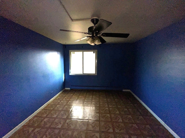 unfurnished room featuring a textured ceiling, baseboard heating, and ceiling fan