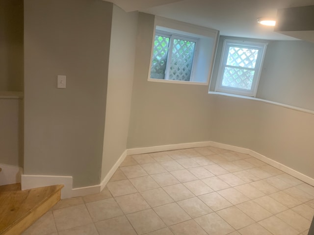 basement with light tile patterned floors