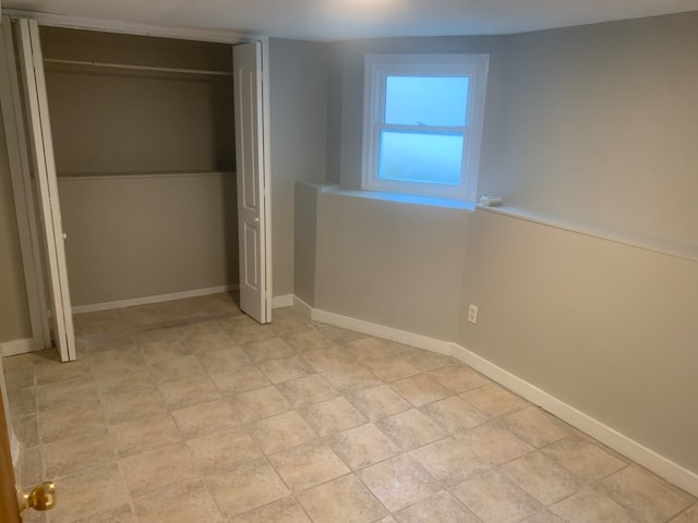 unfurnished bedroom featuring a closet