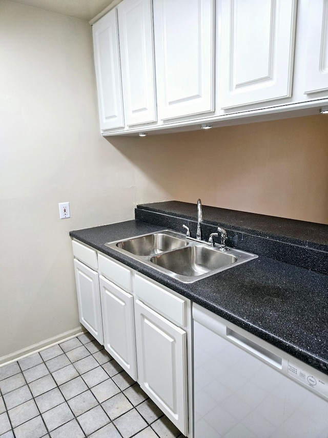 kitchen with white dishwasher, sink, white cabinetry, and light tile patterned floors