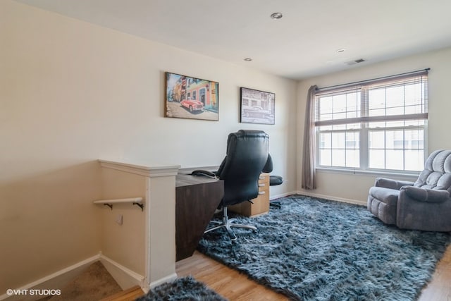 home office featuring hardwood / wood-style floors