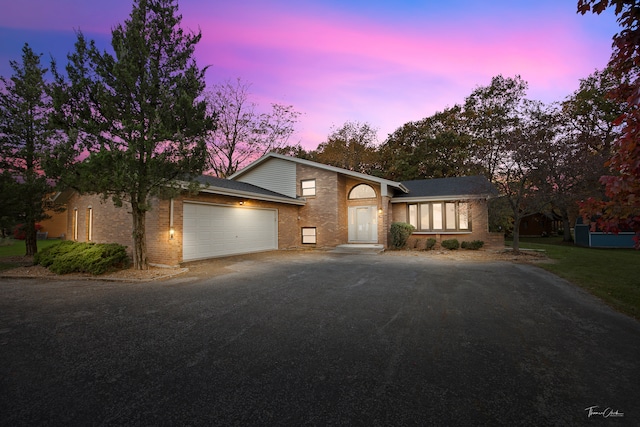 view of front of property with a garage