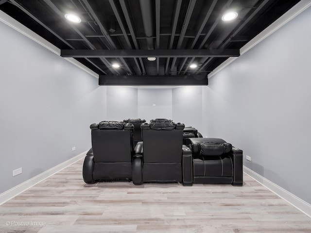 home theater featuring light wood-type flooring