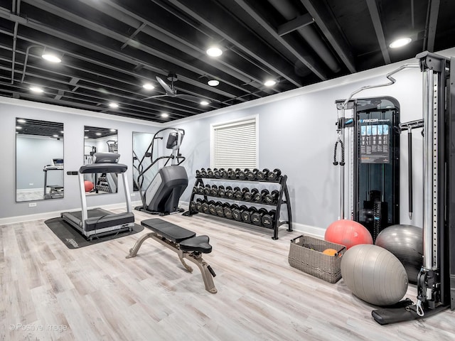 workout area featuring hardwood / wood-style floors