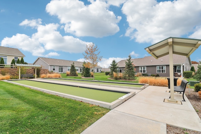 surrounding community featuring a lawn