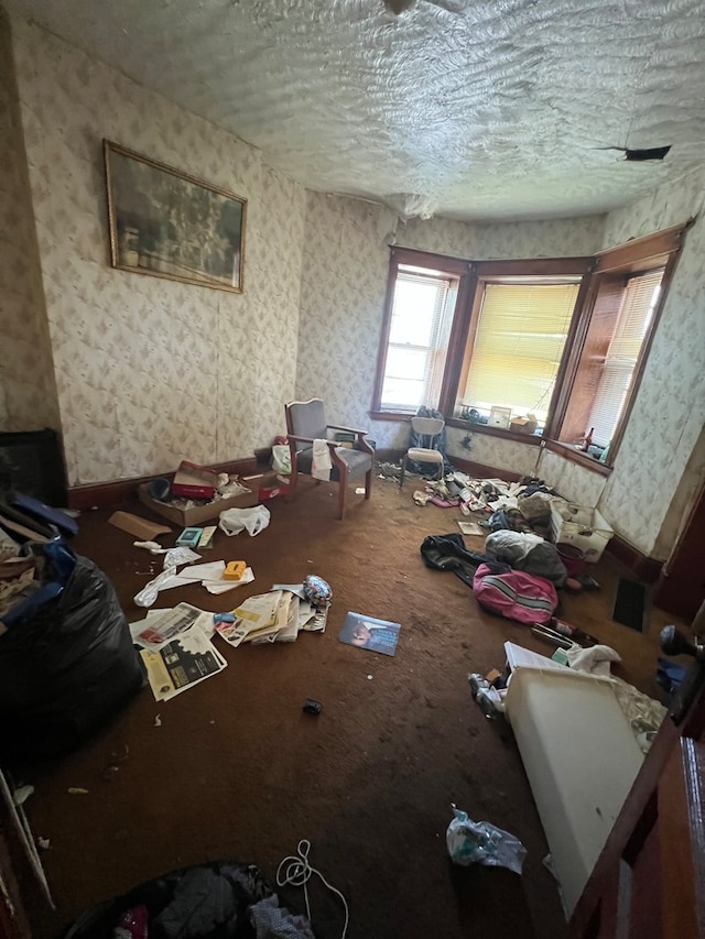 miscellaneous room featuring a textured ceiling