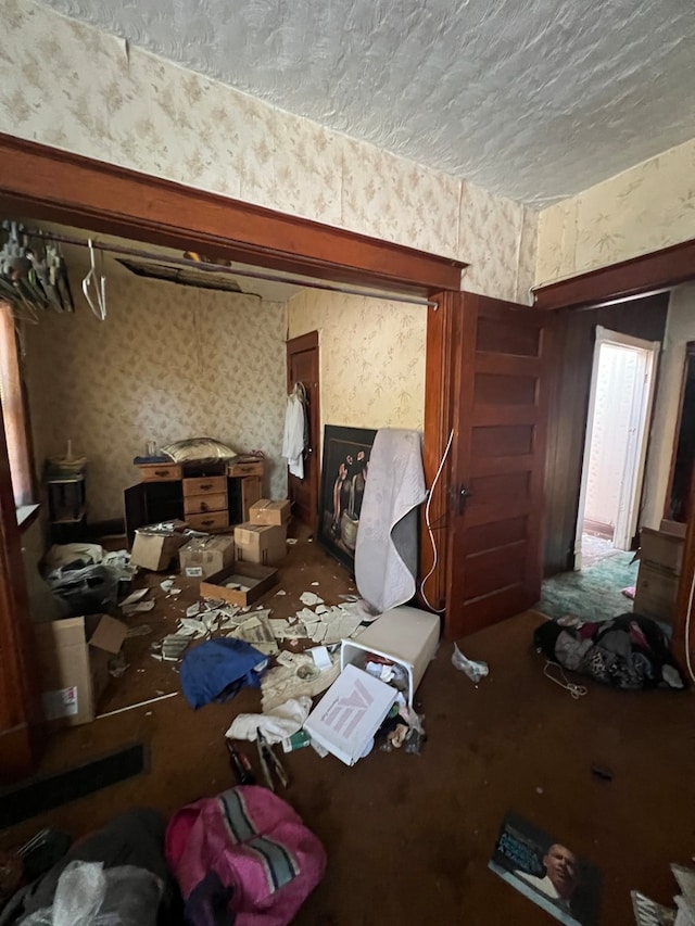 miscellaneous room featuring a textured ceiling