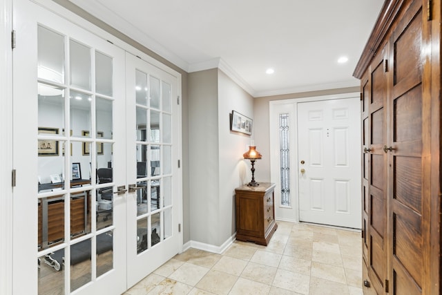 entryway featuring french doors and crown molding