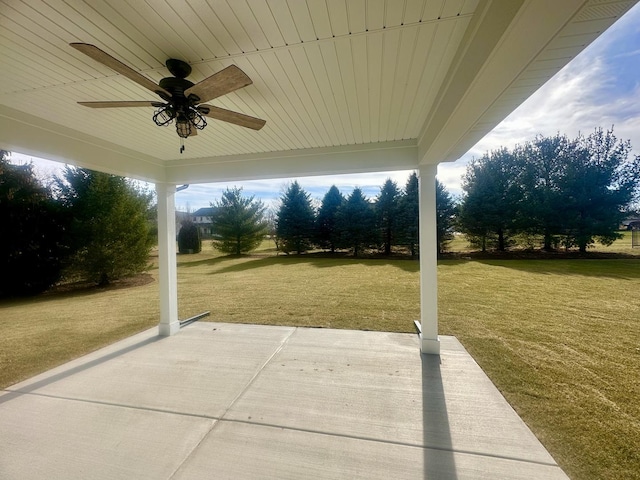 view of patio featuring ceiling fan