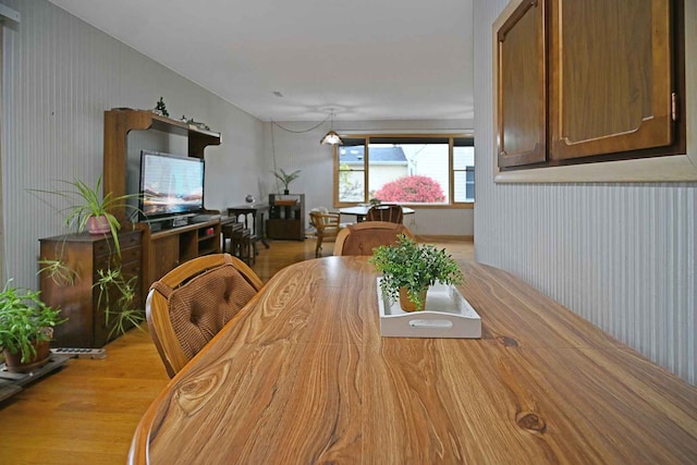 dining room with light hardwood / wood-style floors