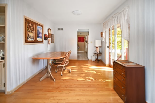 dining space featuring light hardwood / wood-style flooring