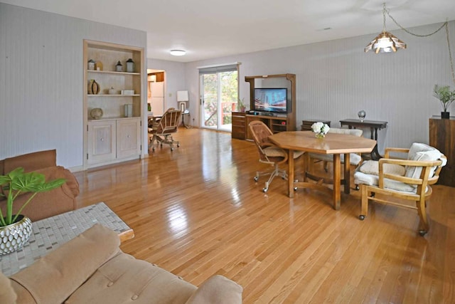 dining area with light wood-type flooring