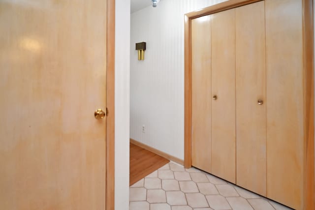 hall with light wood-type flooring