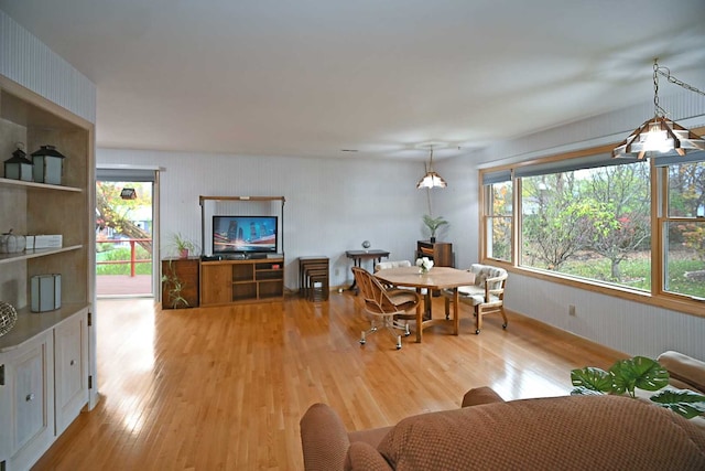 dining area with light wood-type flooring