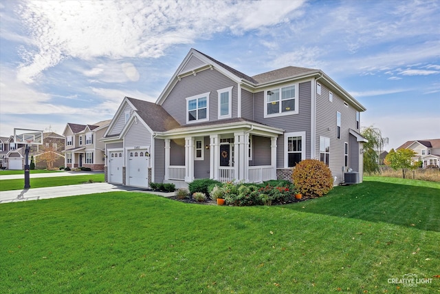 view of front of house with central air condition unit, a front lawn, a porch, and a garage