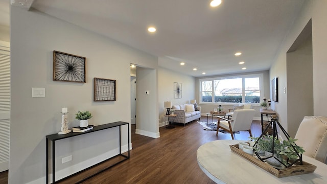 living room featuring dark hardwood / wood-style flooring