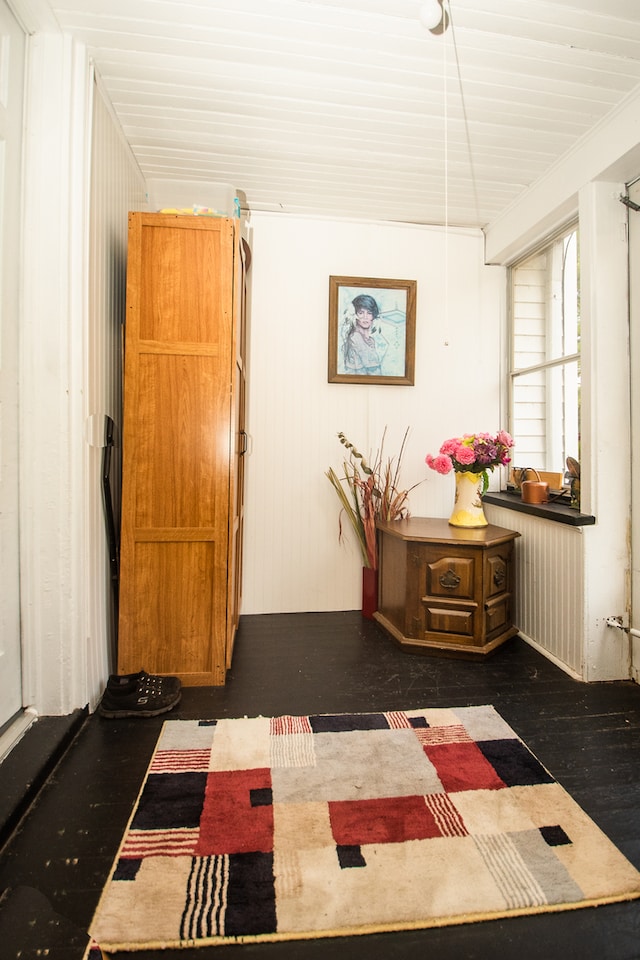 interior space with dark hardwood / wood-style floors