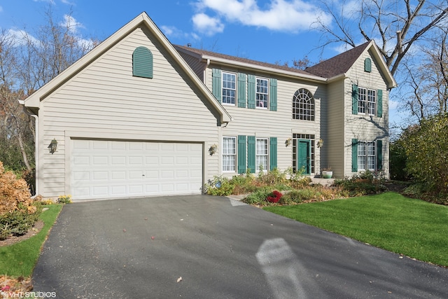 colonial inspired home with a front lawn