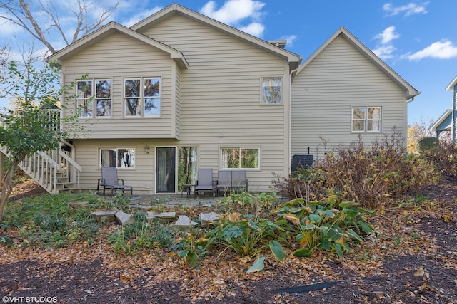 rear view of house with a patio