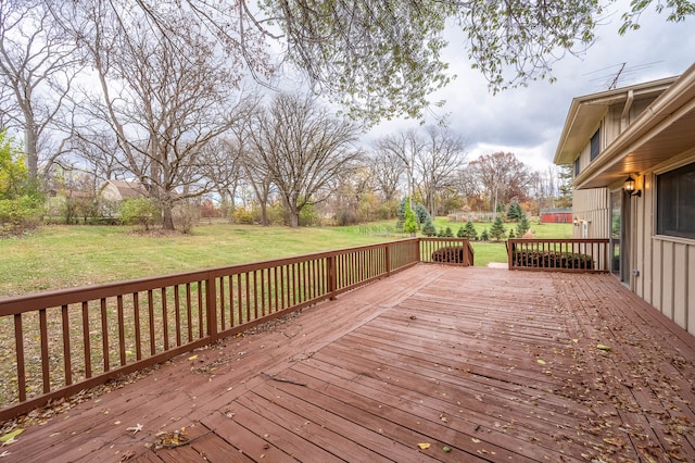 wooden deck with a yard