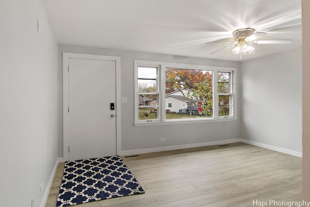 entryway featuring light hardwood / wood-style floors and ceiling fan