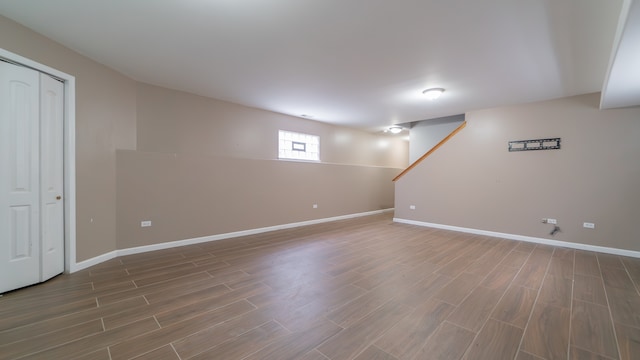 basement featuring hardwood / wood-style flooring