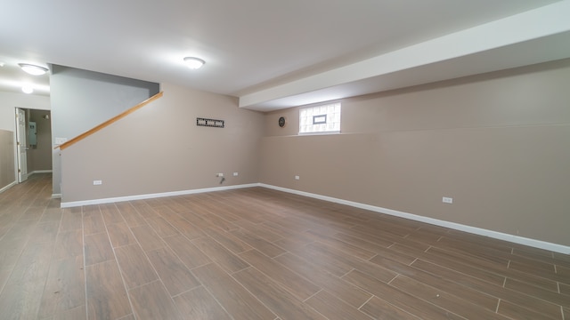 basement with wood-type flooring