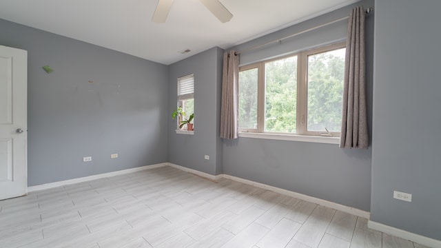 unfurnished room featuring ceiling fan