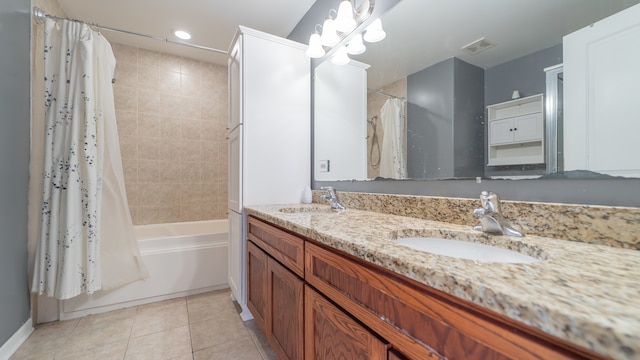 bathroom featuring vanity, shower / tub combo, and tile patterned floors