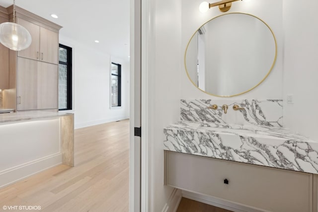 bathroom featuring wood-type flooring