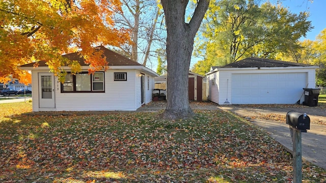 view of side of home with a storage unit