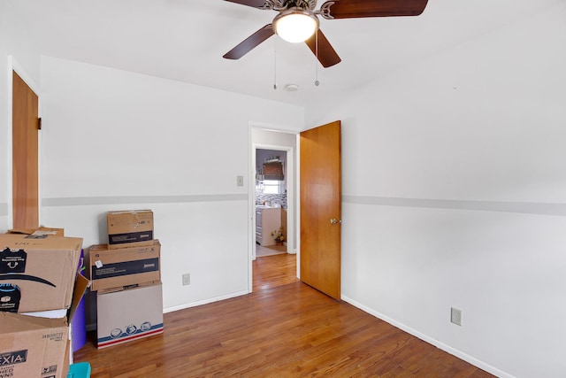 office area with hardwood / wood-style floors and ceiling fan