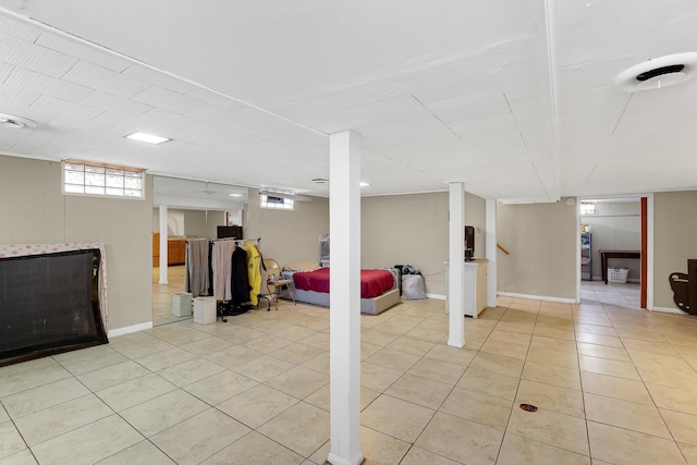 basement with light tile patterned floors