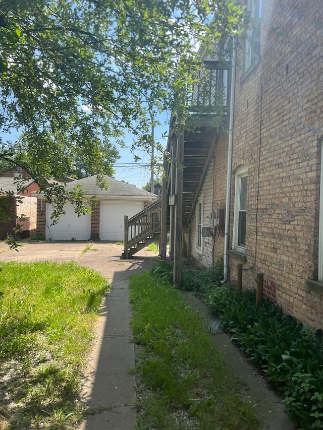 view of side of home featuring a garage