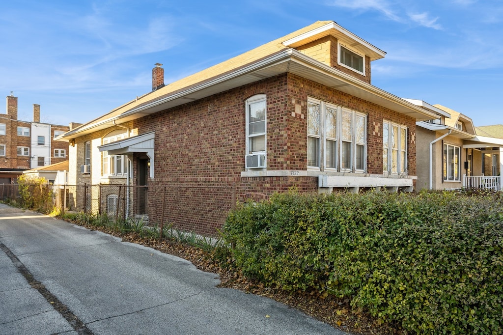 view of home's exterior featuring cooling unit