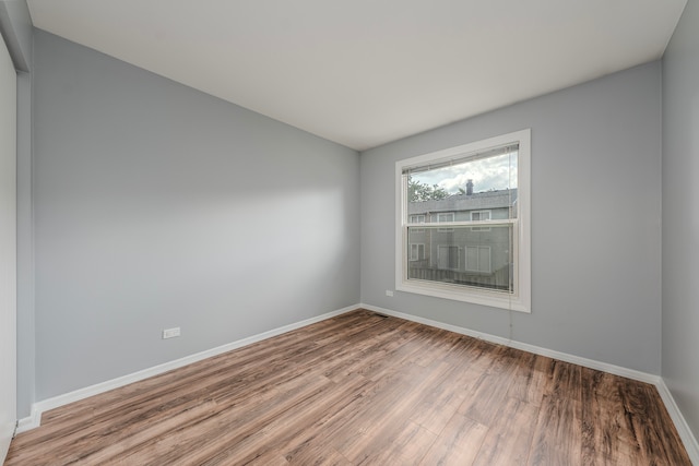 unfurnished room featuring light hardwood / wood-style floors