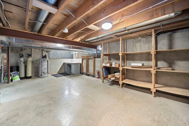 basement featuring gas water heater